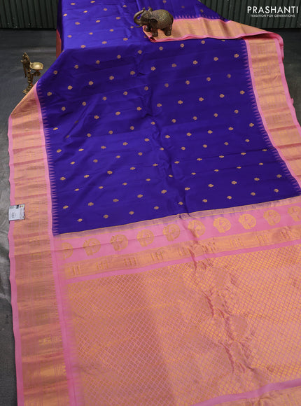 Pure gadwal silk saree blue and peach pink with zari woven buttas and temple design zari woven border