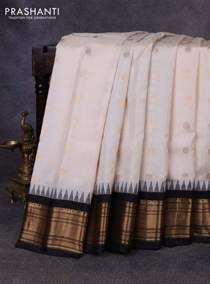 Pure gadwal silk saree off white with zari woven buttas and ganga jamuna border