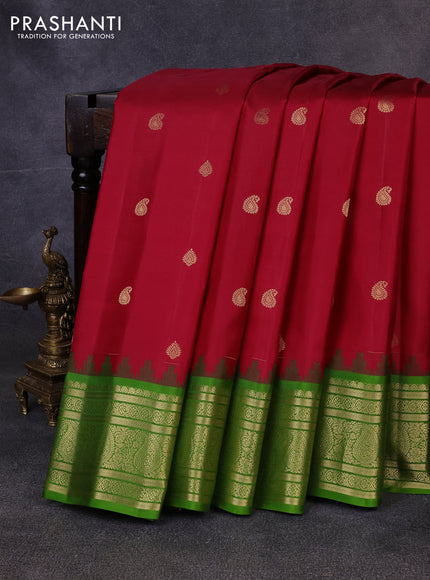 Pure gadwal silk saree wine shade and light green with zari woven buttas and temple design zari woven border