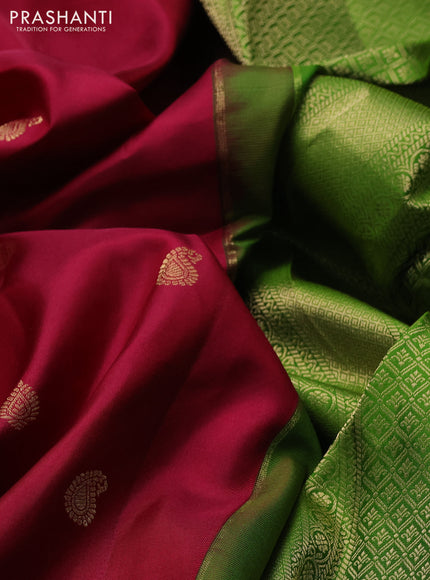 Pure gadwal silk saree wine shade and light green with zari woven buttas and temple design zari woven border