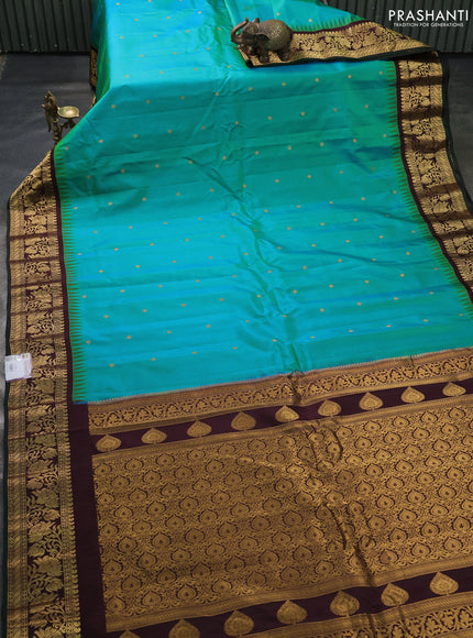 Pure gadwal silk saree teal blue and deep maroon with zari woven buttas and temple design zari woven border