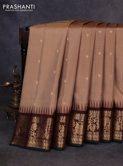 Pure gadwal silk saree sandal and deep wine with zari woven buttas and temple design zari woven border