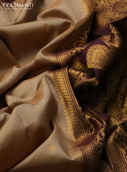 Pure gadwal silk saree sandal and deep wine with zari woven buttas and temple design zari woven border