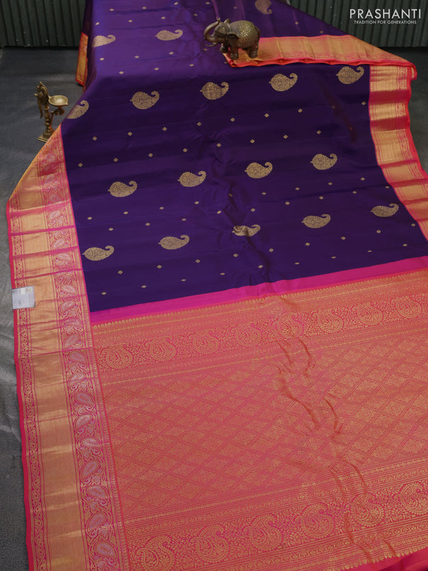 Pure gadwal silk saree purple and pink with allover zari woven buttas and zari woven korvai border