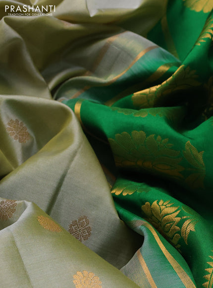 Pure gadwal silk saree pista green and green with zari woven buttas and temple design zari woven border