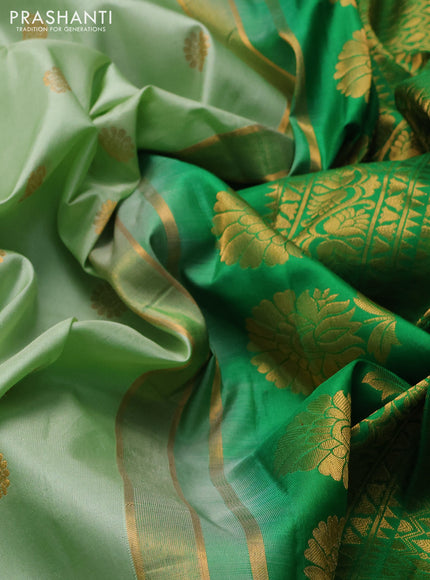 Pure gadwal silk saree pastel green and green with allover zari woven buttas and temple design zari woven border
