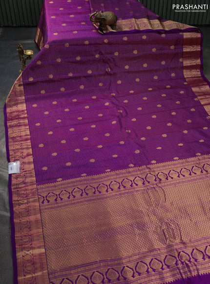 Pure gadwal silk saree dark magenta pink with allover zari checks & buttas and zari woven border