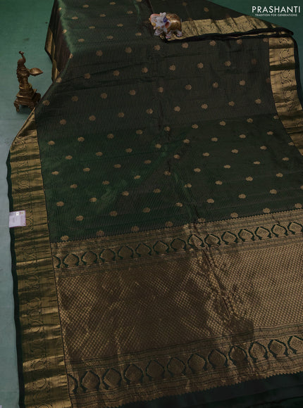 Pure gadwal silk saree bottle green with allover zari checks & buttas and zari woven border