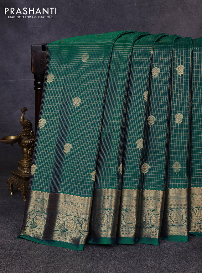 Pure gadwal silk saree peacock green with allover small zari checks & buttas and zari woven border