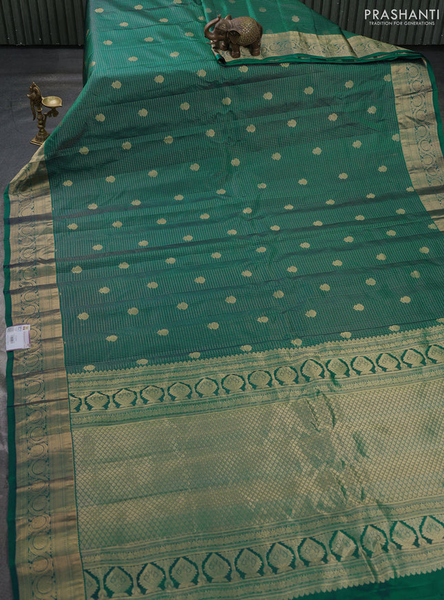 Pure gadwal silk saree peacock green with allover small zari checks & buttas and zari woven border