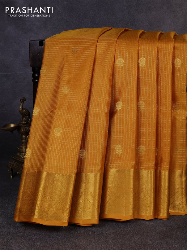 Pure gadwal silk saree mustard yellow with allover zari checks & buttas and zari woven border