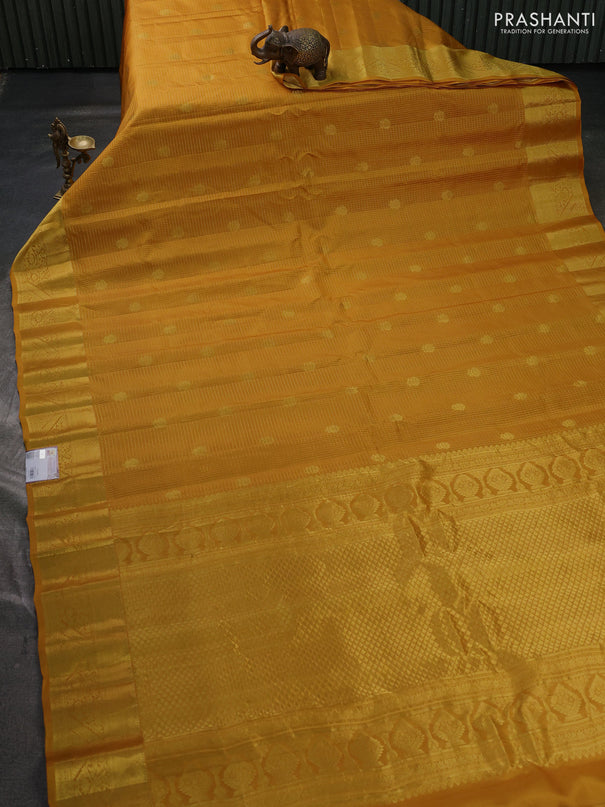Pure gadwal silk saree mustard yellow with allover zari checks & buttas and zari woven border