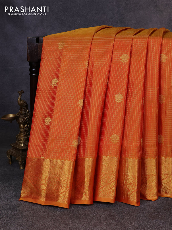 Pure gadwal silk saree sunset orange with allover zari checks & buttas and zari woven border