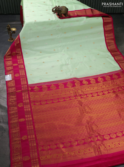 Pure gadwal silk saree pista green and dark pink with allover silver & zari woven buttas and rettapet zari woven korvai butta border