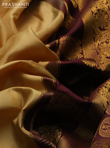 Pure gadwal silk saree sandal and coffee brown with allover zari woven buttas and rettapet zari woven korvai butta border