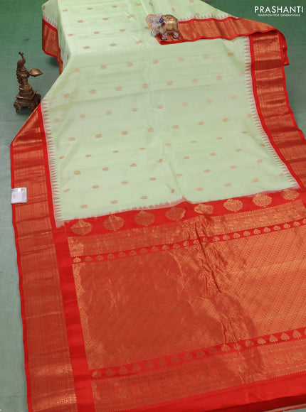 Pure gadwal silk saree pista green and red with allover zari woven buttas and temple design zari woven border