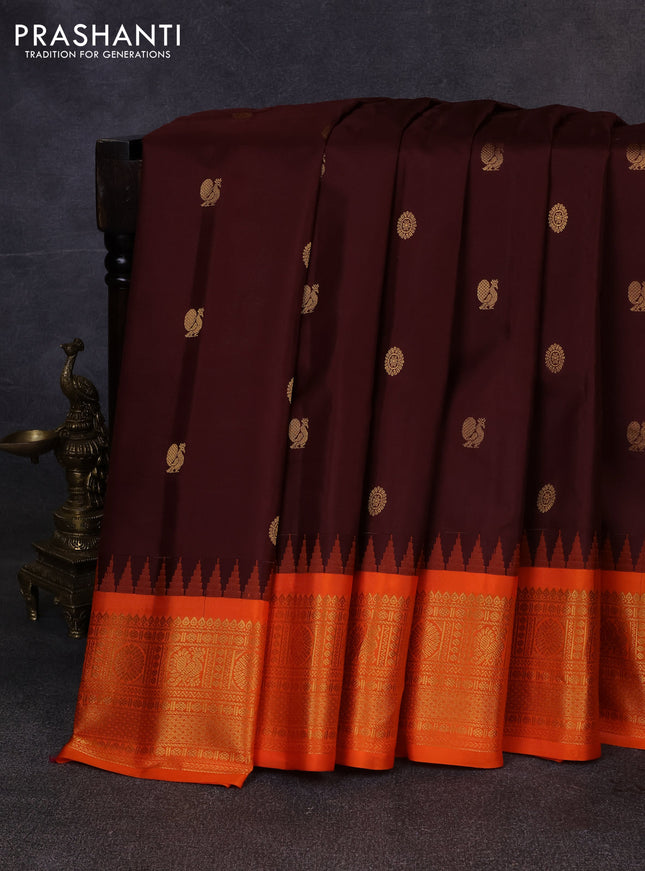 Pure gadwal silk saree coffee brown and orange with allover zari woven buttas and temple design zari woven border