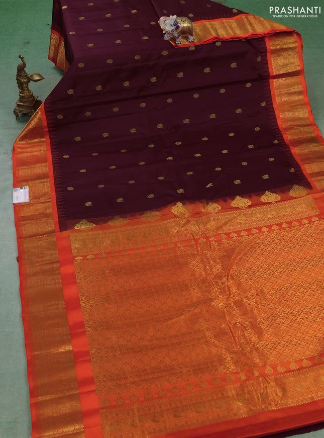 Pure gadwal silk saree coffee brown and orange with allover zari woven buttas and temple design zari woven border