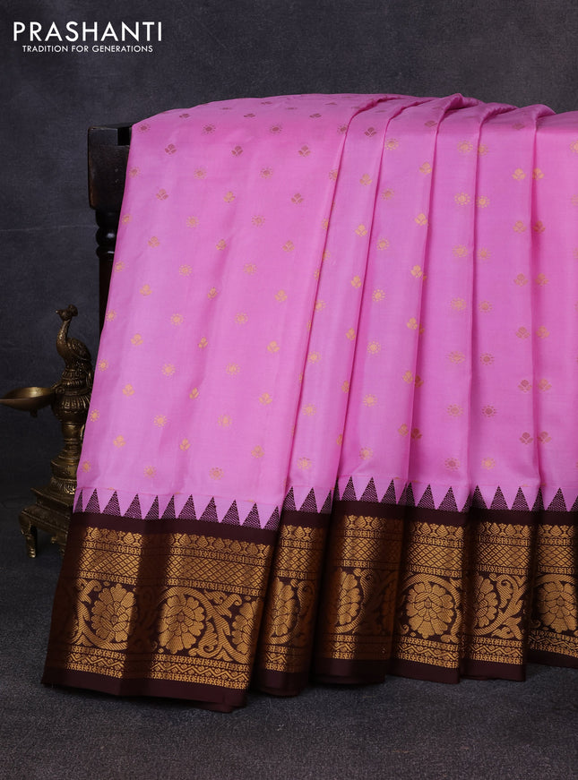 Pure gadwal silk saree lotus pink and coffee brown with allover zari woven buttas and temple design zari woven border