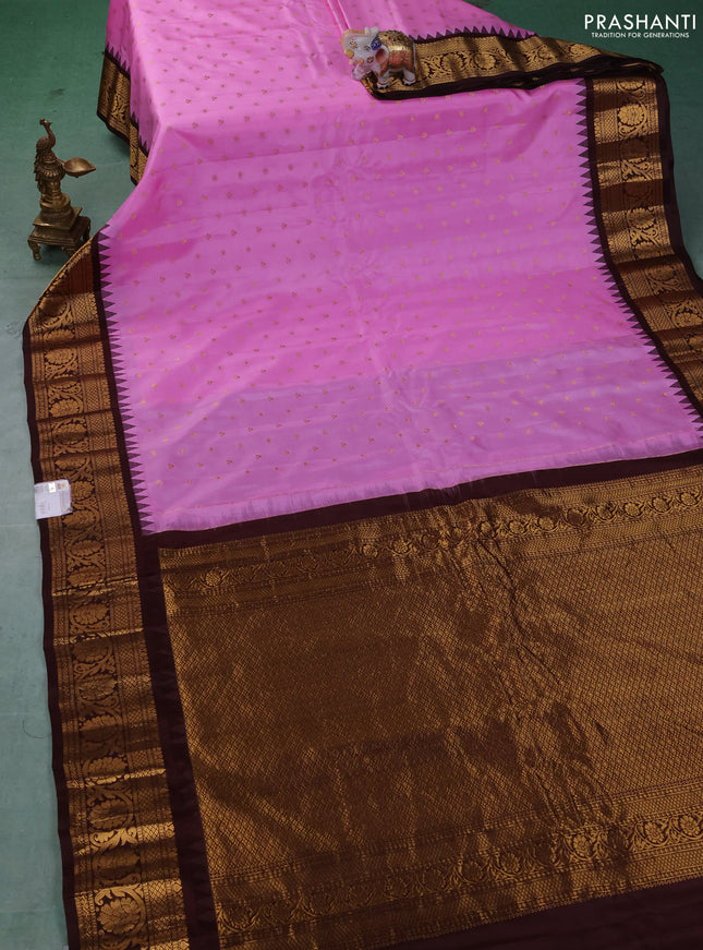 Pure gadwal silk saree lotus pink and coffee brown with allover zari woven buttas and temple design zari woven border
