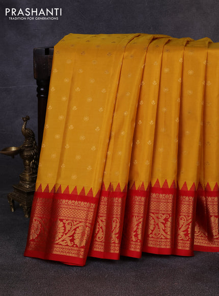 Pure gadwal silk saree mustard yellow and red with allover zari woven buttas and temple design zari woven border