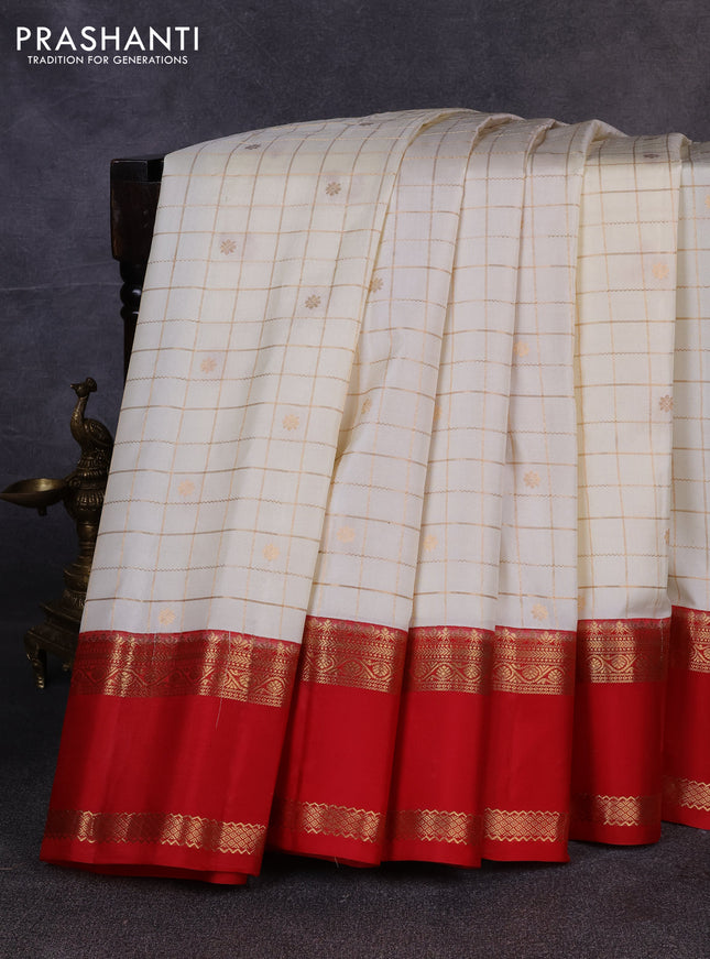 Pure gadwal silk saree off white and red with allover zari checks & buttas and rettapet zari woven korvai border