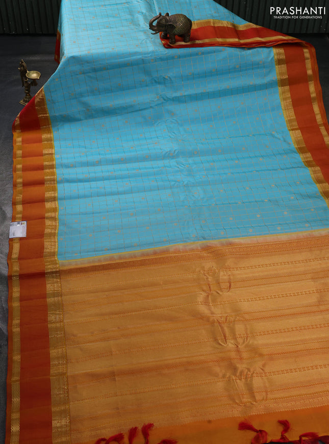 Pure gadwal silk saree teal blue and sunset orange with allover zari checks & buttas and rettapet zari woven border