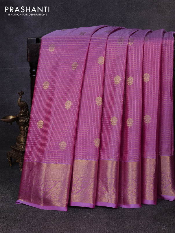 Pure gadwal silk saree dual shade of lavender with allover zari checks & buttas and zari woven border