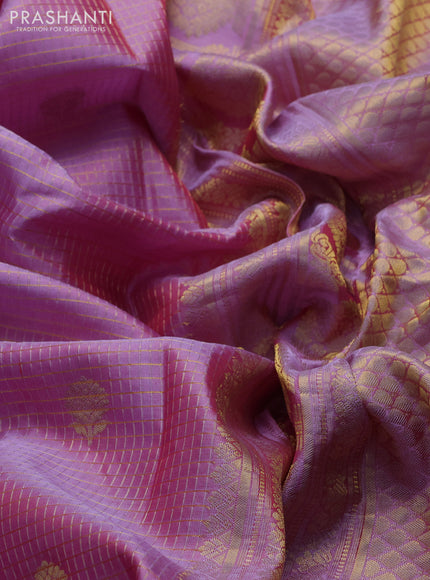 Pure gadwal silk saree dual shade of lavender with allover zari checks & buttas and zari woven border