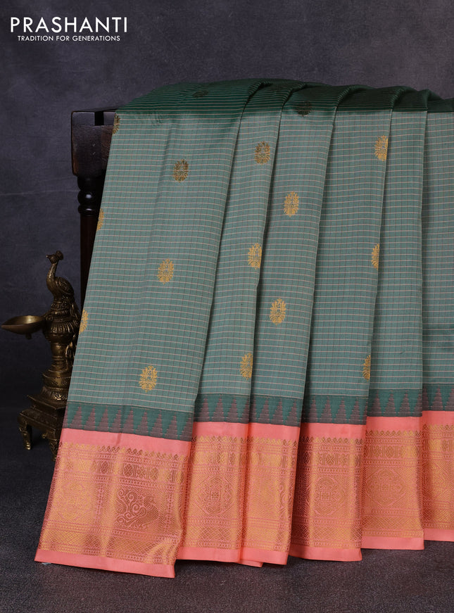 Pure gadwal silk saree green shade and peach orange with allover checks & buttas and temple design zari woven border