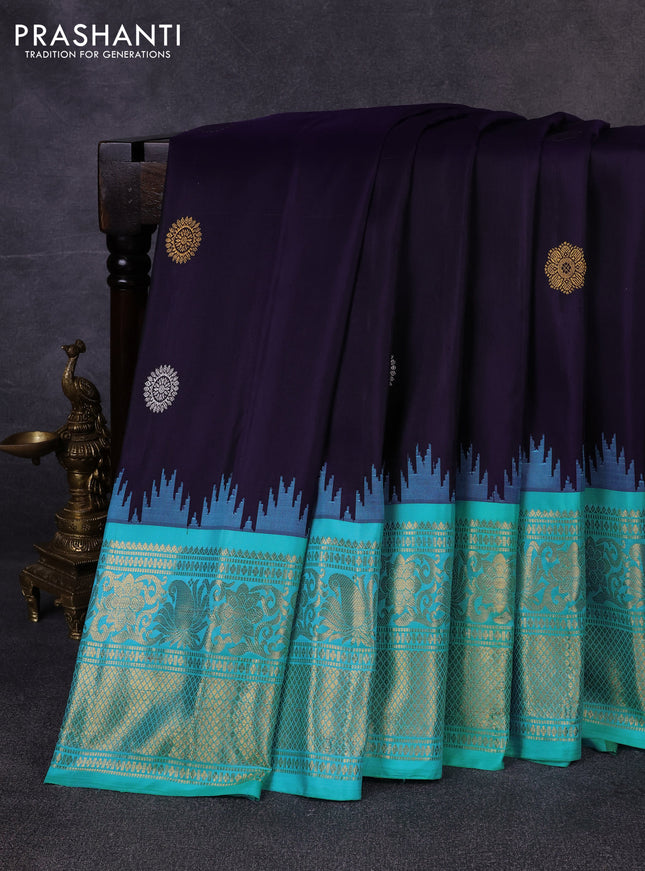 Pure gadwal silk saree navy blue and teal blue with allover silver & zari woven buttas and temple design zari woven border