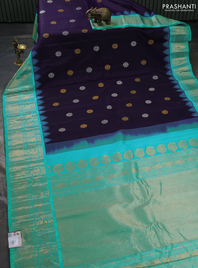 Pure gadwal silk saree navy blue and teal blue with allover silver & zari woven buttas and temple design zari woven border