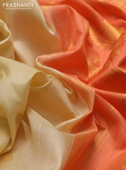 Pure gadwal silk saree cream and peach orange with allover silver & zari woven buttas and zari woven korvai border