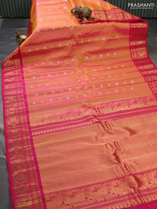 Pure gadwal silk saree dual shade of yellow and dark pink with allover zari checks & buttas and zari woven border