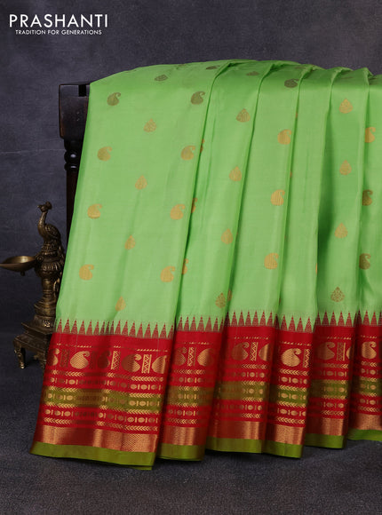 Pure gadwal silk saree pista green and red with allover zari woven buttas and temple design zari woven border
