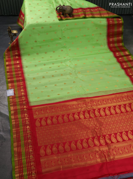 Pure gadwal silk saree pista green and red with allover zari woven buttas and temple design zari woven border