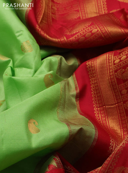 Pure gadwal silk saree pista green and red with allover zari woven buttas and temple design zari woven border