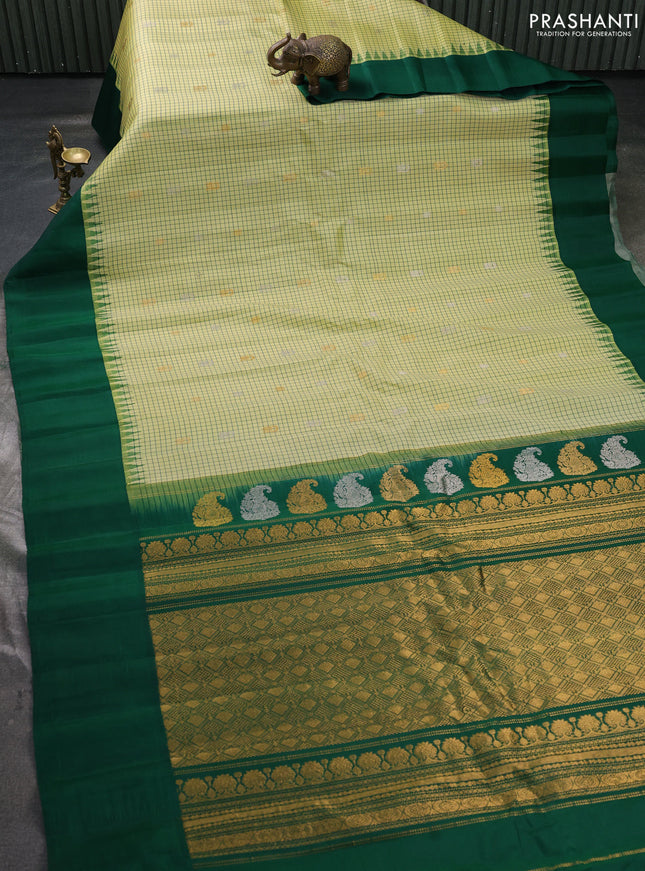 Pure gadwal silk saree pista green and green with allover silver & zari woven buttas and temple design simple border