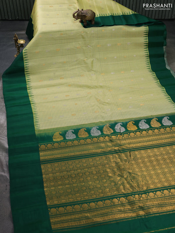 Pure gadwal silk saree pista green and green with allover silver & zari woven buttas and temple design simple border