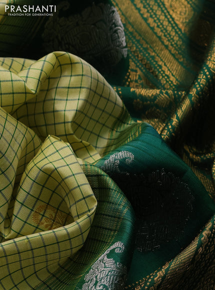 Pure gadwal silk saree pista green and green with allover silver & zari woven buttas and temple design simple border