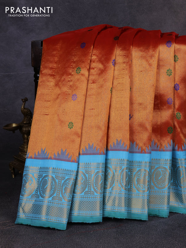 Pure gadwal tissue silk saree rust shade and teal blue with allover thread woven buttas and temple design zari woven border