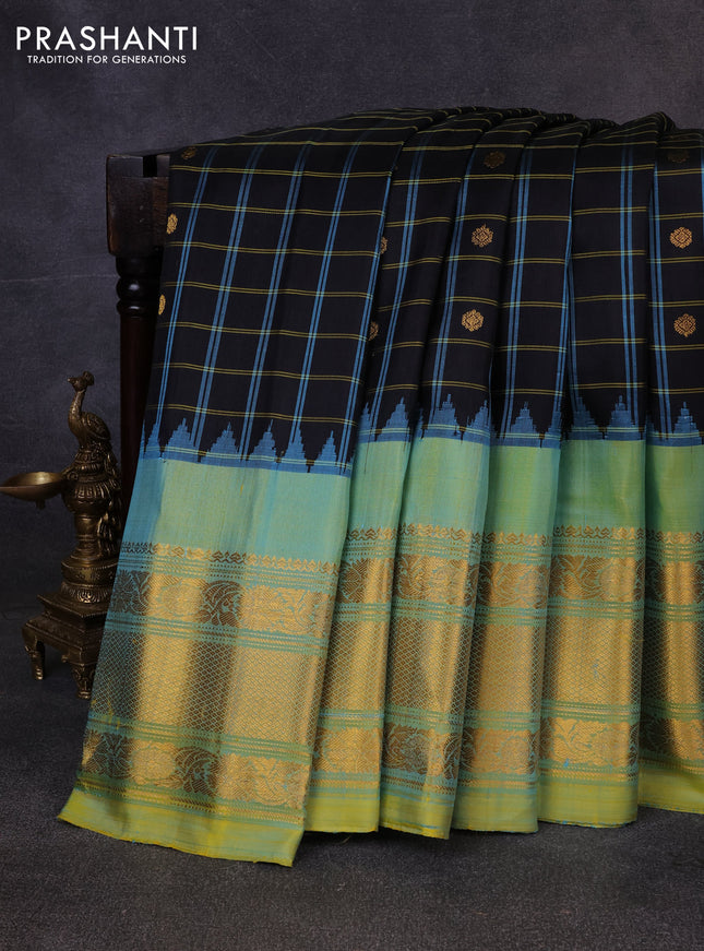 Pure gadwal silk saree black and pista green with allover checks & zari woven buttas and temple design long zari woven border