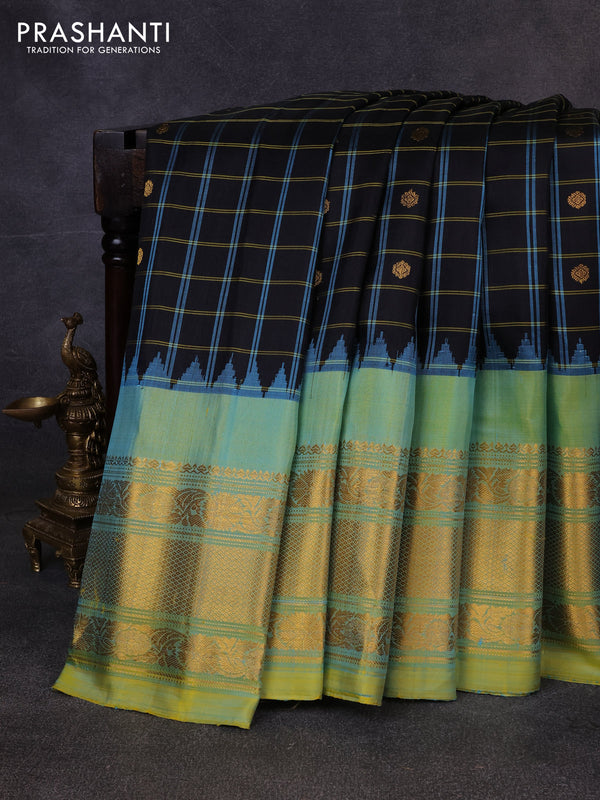 Pure gadwal silk saree black and pista green with allover checks & zari woven buttas and temple design long zari woven border