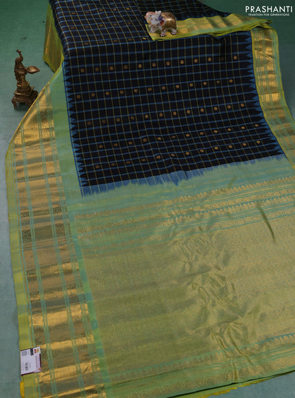 Pure gadwal silk saree black and pista green with allover checks & zari woven buttas and temple design long zari woven border