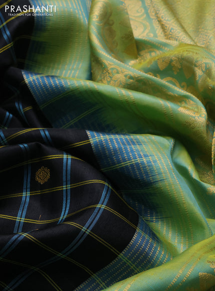 Pure gadwal silk saree black and pista green with allover checks & zari woven buttas and temple design long zari woven border