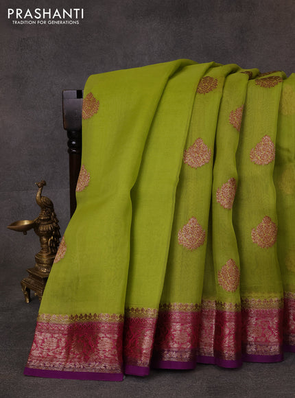 Banarasi organza saree light green and purple with thread & zari woven buttas and woven border