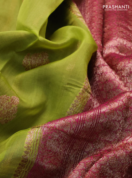 Banarasi organza saree light green and purple with thread & zari woven buttas and woven border