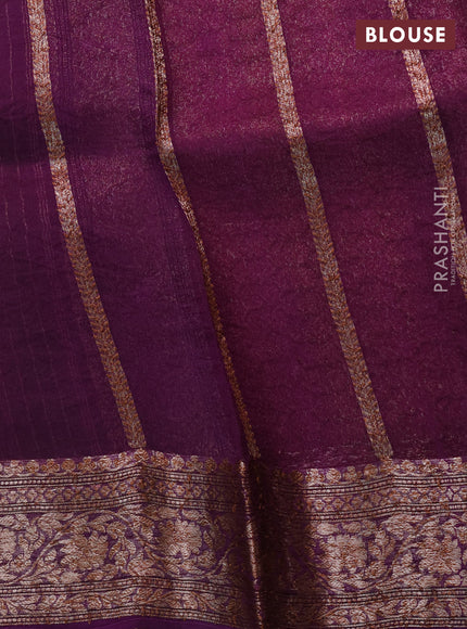 Banarasi organza saree light green and purple with thread & zari woven buttas and woven border