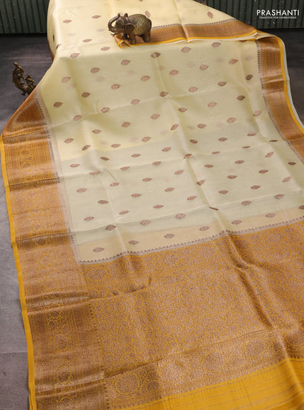 Banarasi organza saree cream and mustard yellow with thread & zari woven buttas and long woven border