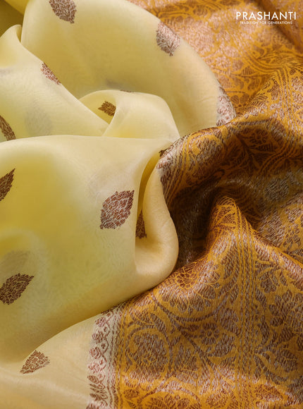 Banarasi organza saree cream and mustard yellow with thread & zari woven buttas and long woven border